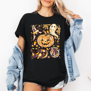 Cute Halloween Painted Pumpkin Black Cat Ghost Witch Scene Of Playful Spooky Charm Graphic Tee — view 1