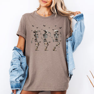 Dancing Cowboy Skeletons And Halloween Bats Fantasy Parade In Moonlit Western Night Scene Graphic Tee — view 2