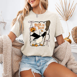 Honk or Treat Cute Goose Halloween Witch Cozy Spooky Season Mascot Illustration For Halloween Party Wear Graphic Tee — view 1