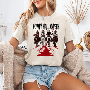 Howdy Halloween Western Cowgirl Spooky Vibe Inspired by Desert Nights and Saloon Legends Graphic Tee — view 1