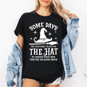 Some Days You Have To Put On The Hat Witch Halloween Sassy Graphic Tee For Costume Parties — view 1