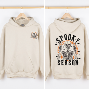 Spooky Season Front And Back Skeleton With Ghosts And Witch Motifs Halloween Themed Hoodie — view 1