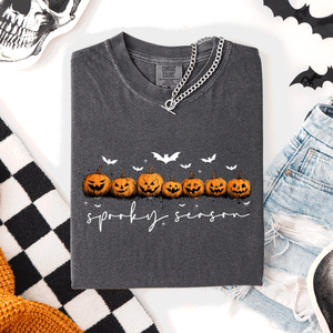 Spooky Season Pumpkins Halloween Pink Skeletons With Bow Adornments Comfort Colors Tee — view 1