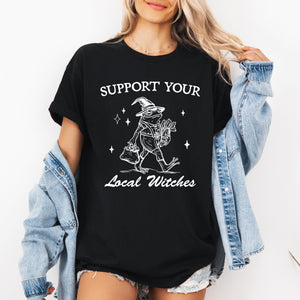 Support Your Local Witches Frog Halloween Witchy Spooky Nighttime Charm Graphic Tee — view 4