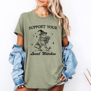 Support Your Local Witches Frog Halloween Witchy Spooky Nighttime Charm Graphic Tee — view 2