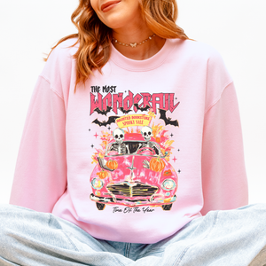 The Most Wonderful Time Of The Year Reading Skeletons Spooky Halloween Graphic Sweatshirt — view 1